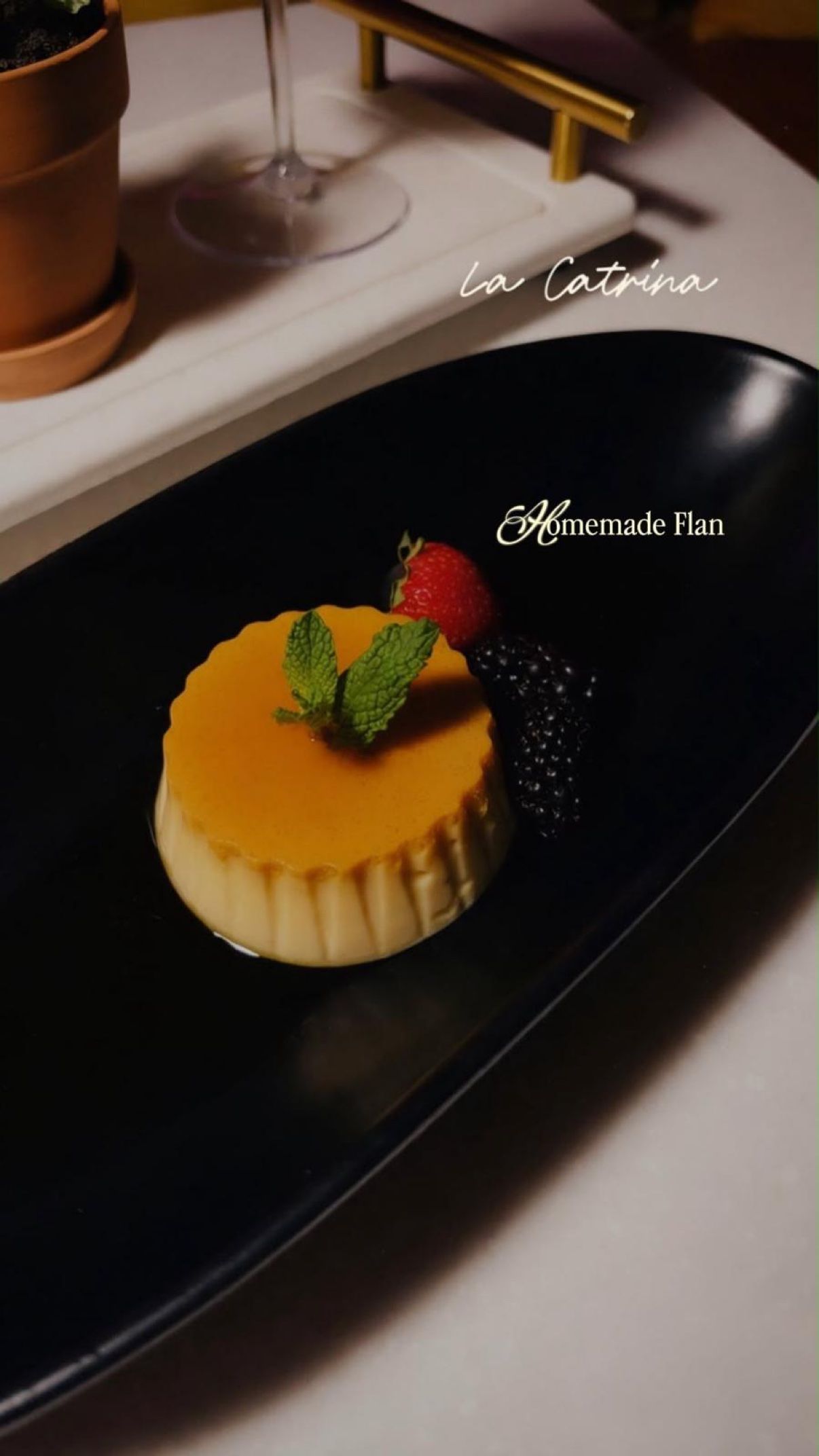 Homemade flan — caramel flan with strawberry, blackberry and mint